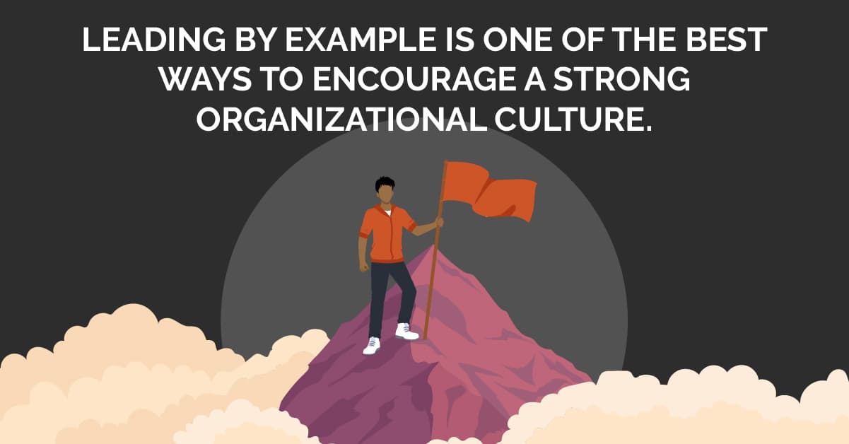 Image: The illustration of a man standing on a mountain peak above the clouds holding a red flag. Text: Leading by example is one of the best ways to encourage a strong organizational culture.